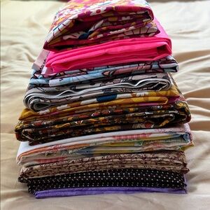10 , bundles ,New Fabric pieces good size to med. Firm on the prices